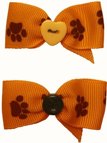 Dog Hair Bows Two Orange with Black Paw Prints 